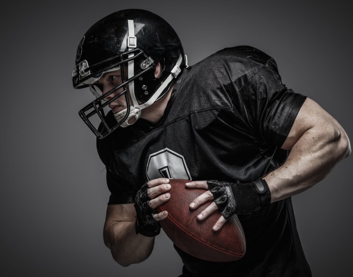 American football player with ball